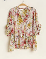 Floral ruffle blouse