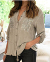 Long button down top with sequin pockets