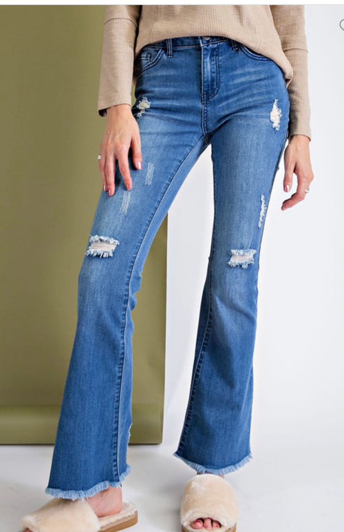 Distressed bell-bottom denim