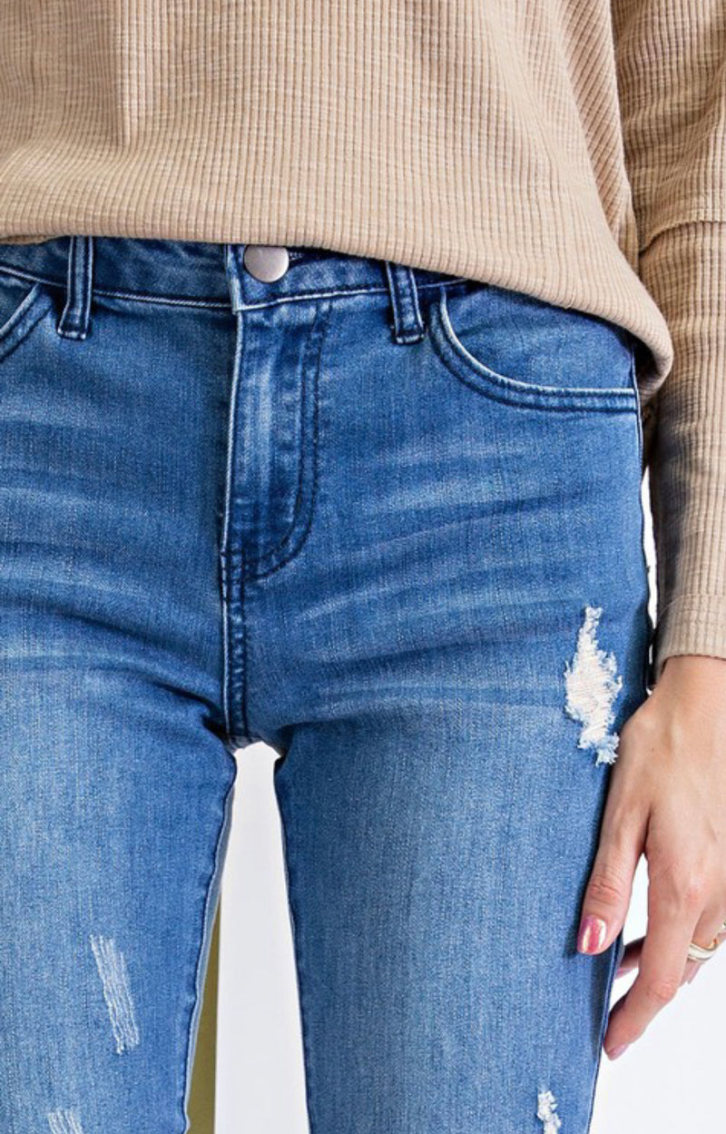 Distressed bell-bottom denim
